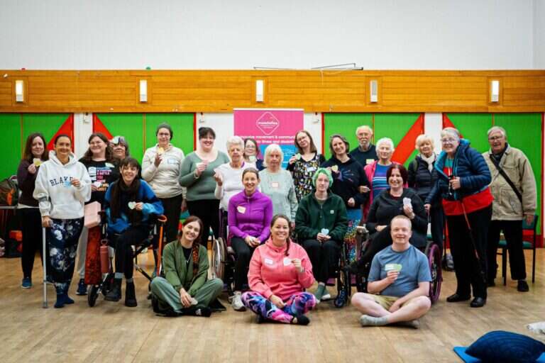 Team Mob and community members together at the end of the Wonford retreat day, smiling and sharing notes.