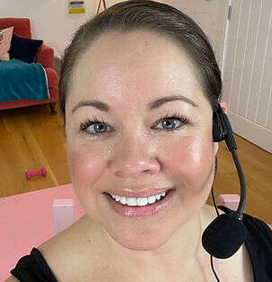 mobilates instructor leanne smiling wearing a Britney mic