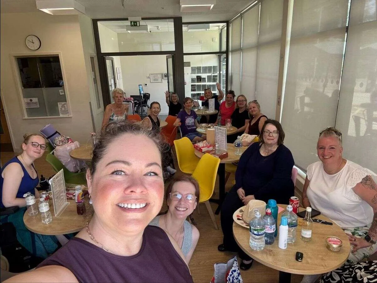 A large group of Mobilates members smiling together at Paddock Wood after the Pilates assessment