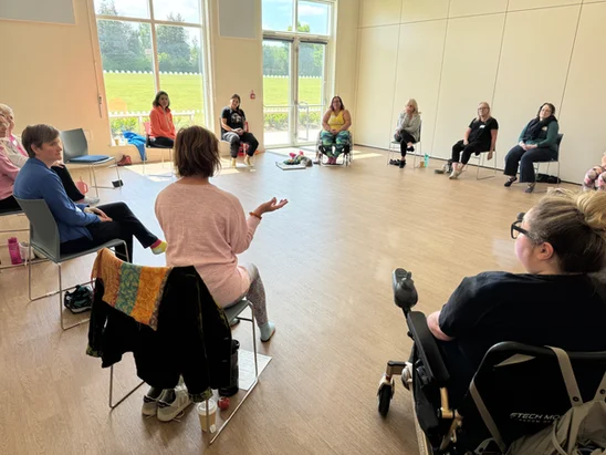 Mobilates members exercising together at a retreat.